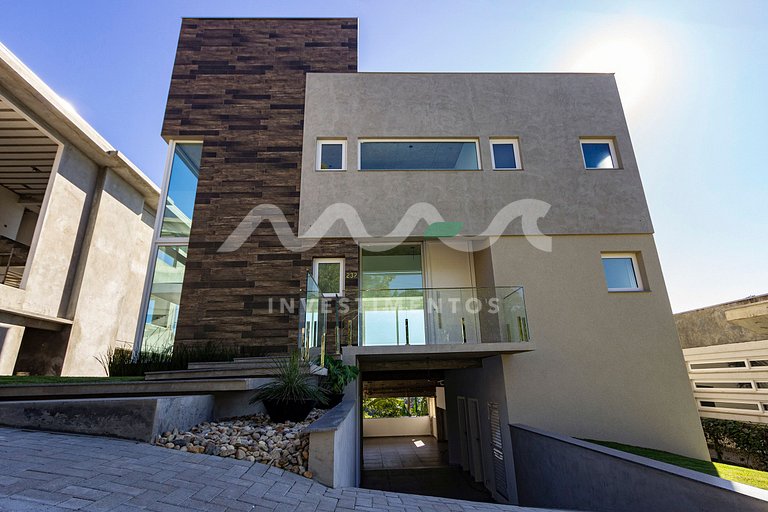 Casa con piscina infinita en Condomínio Panorânico